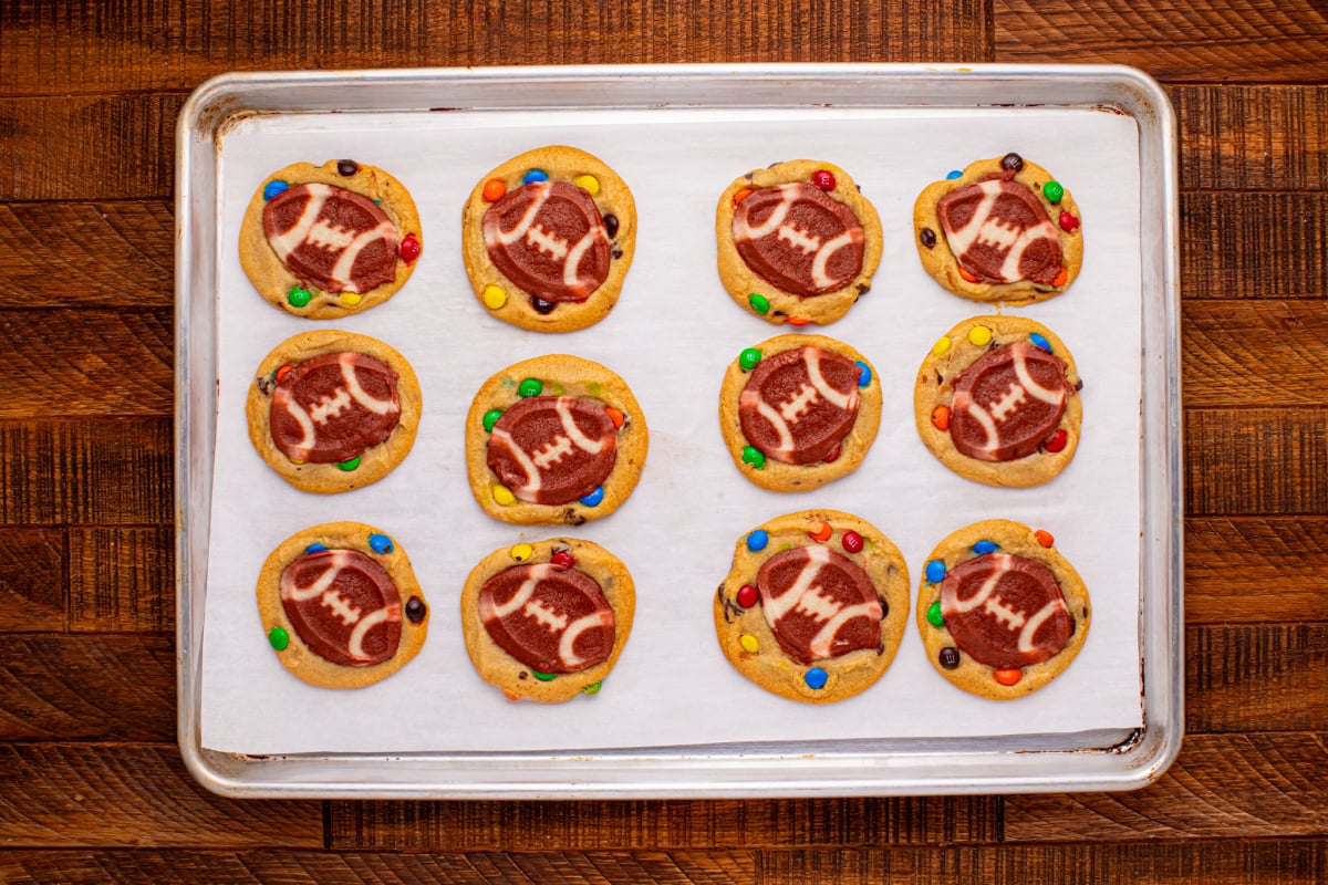 Simple football cookies on a baking sheet