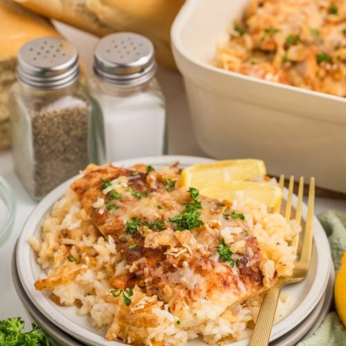 Place fish and rice on a plate and bake