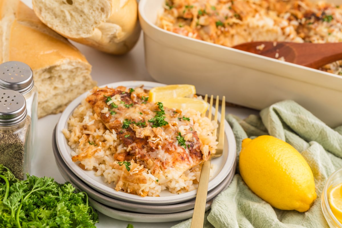 Grilled fish and rice on plate
