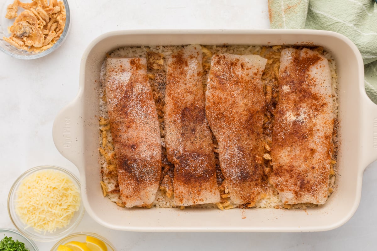 Onions and seasoned fish served over rice