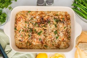 baked fish and rice in a baking dish