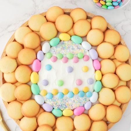 Easter Egg Frosting Board surrounded by cookies