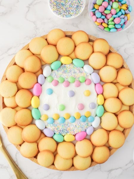 Easter Egg Frosting Board surrounded by cookies