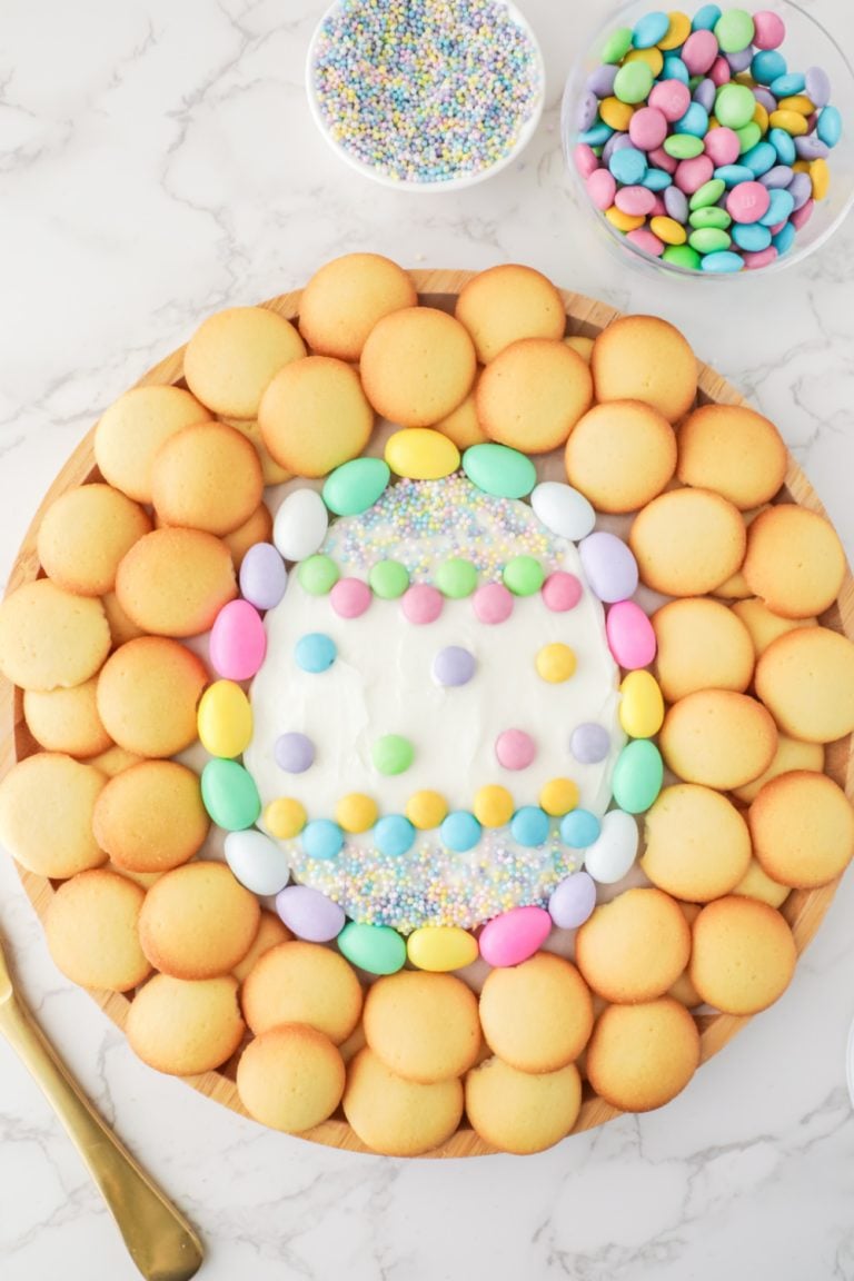 Easter Egg Frosting Board surrounded by cookies