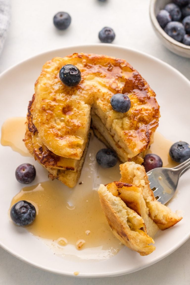 English Muffin French Toast on a plate with blueberries