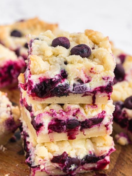 Blueberry Lemon Pie Bars stacked on top of each other