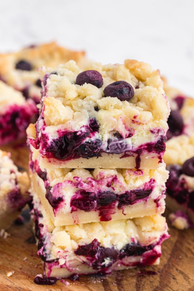 Blueberry Lemon Pie Bars stacked on top of each other