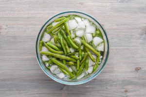 green bean in an ice bath