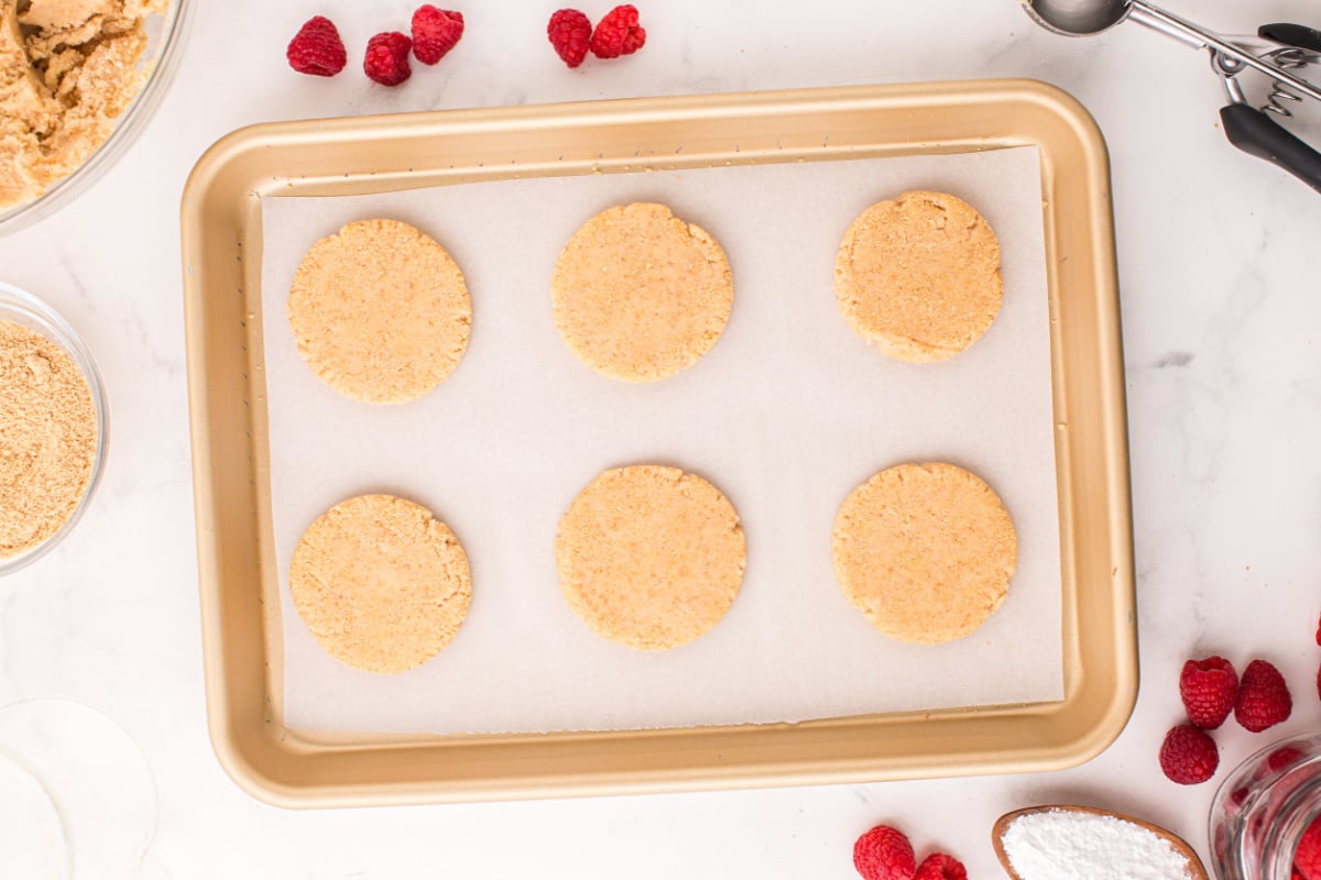 Flatten cookie dough balls.