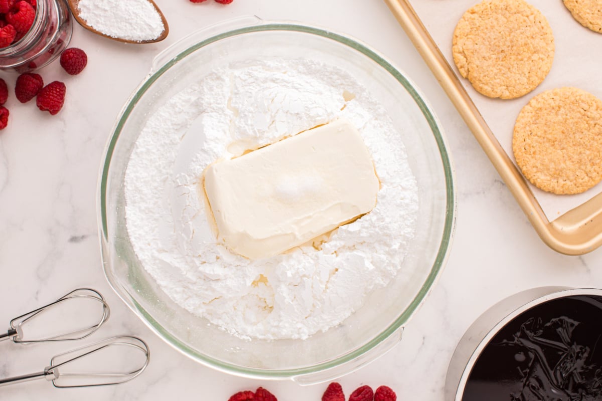 Place powdered sugar, cream cheese, almond extract, and salt in a mixing bowl