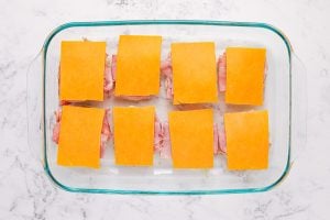 cheese slices added to top of ham