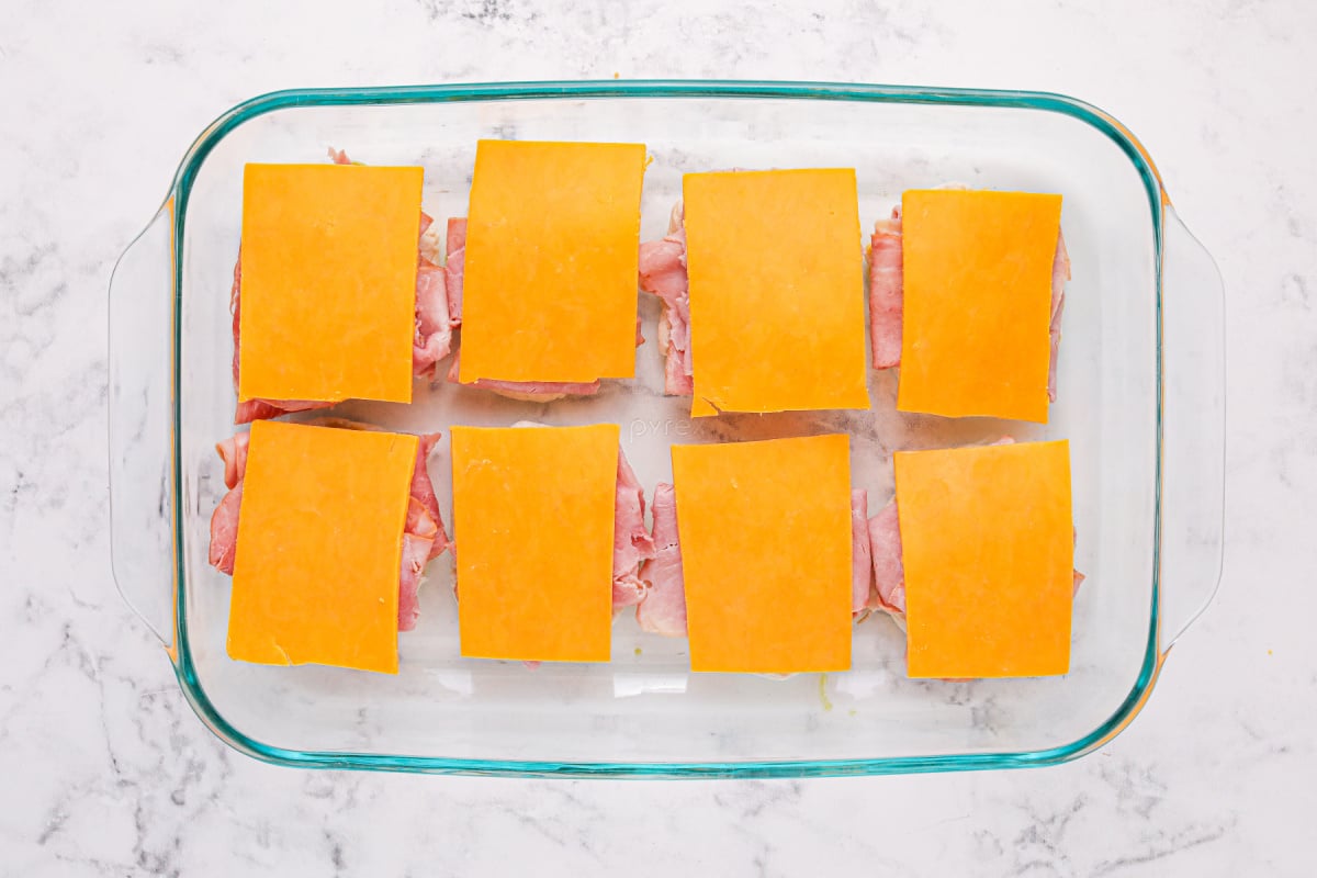 Add cheese slices to top of ham