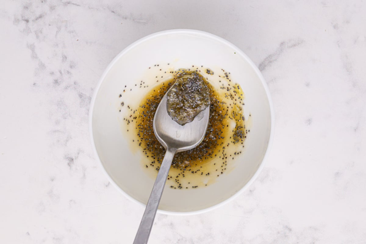 Place melted cream, remaining honey and poppy seeds in a small bowl