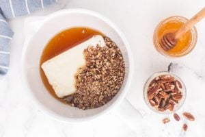 ingredients for Honey Pecan Cream Cheese Spread in a mixing bowl
