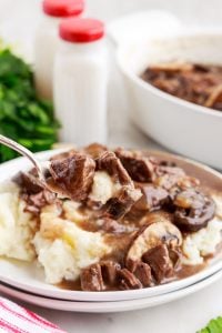Instant Pot Stewed Beef with Mushroom Gravy on a plate