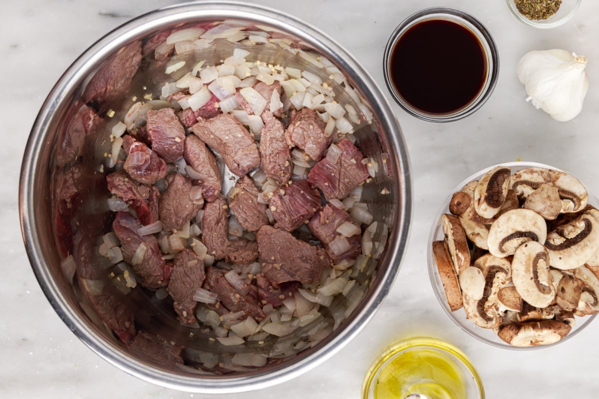 Brown the meat cubes in the Instant Pot