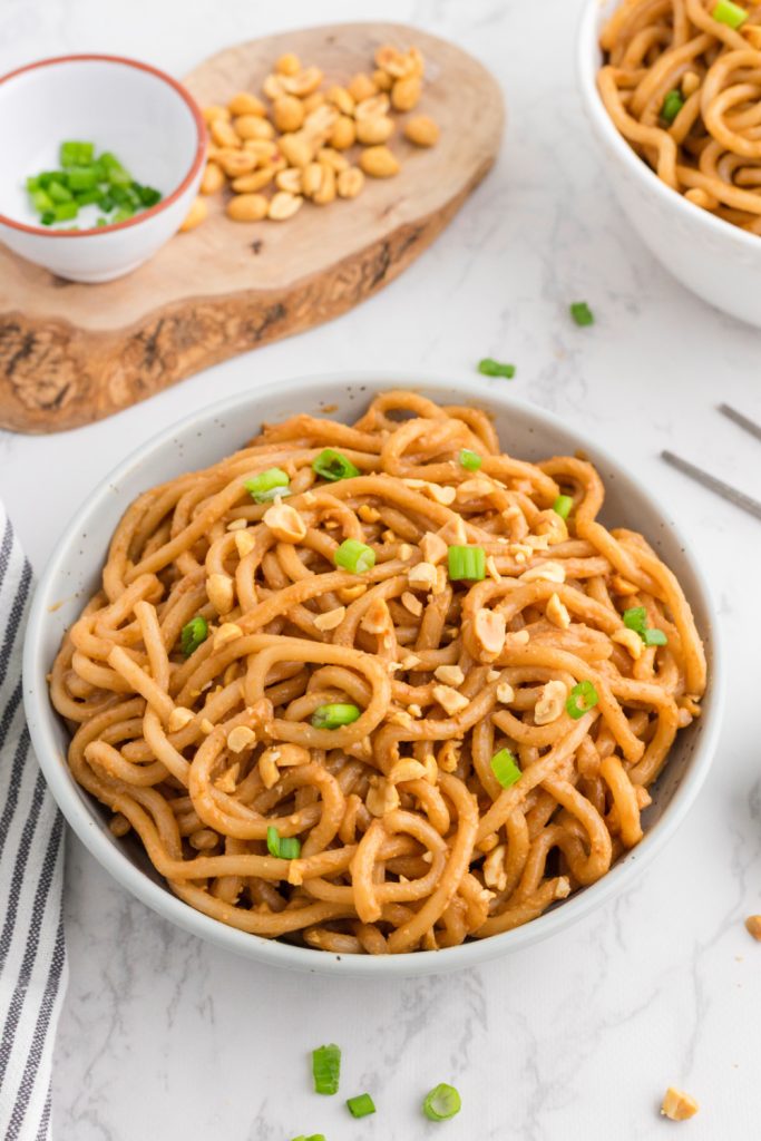 Spicy peanut noodles in bowl