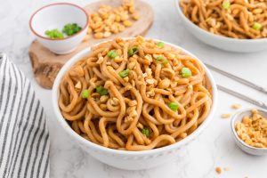 spicy peanut noodles in a bowl