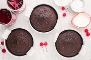 cooked cakes in 3 6 inch baking dishes