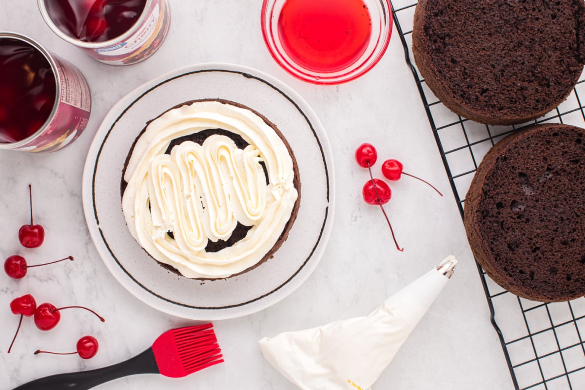 Add the whipped icing to the cake