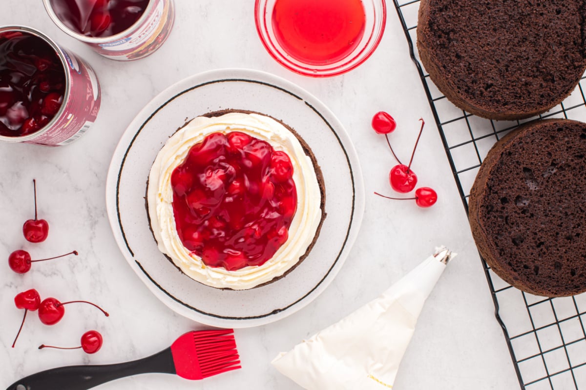 Add cherry filling to the center of the cake