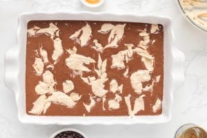 spoonful of the peanut butter cheesecake mixture dropped into cake batter