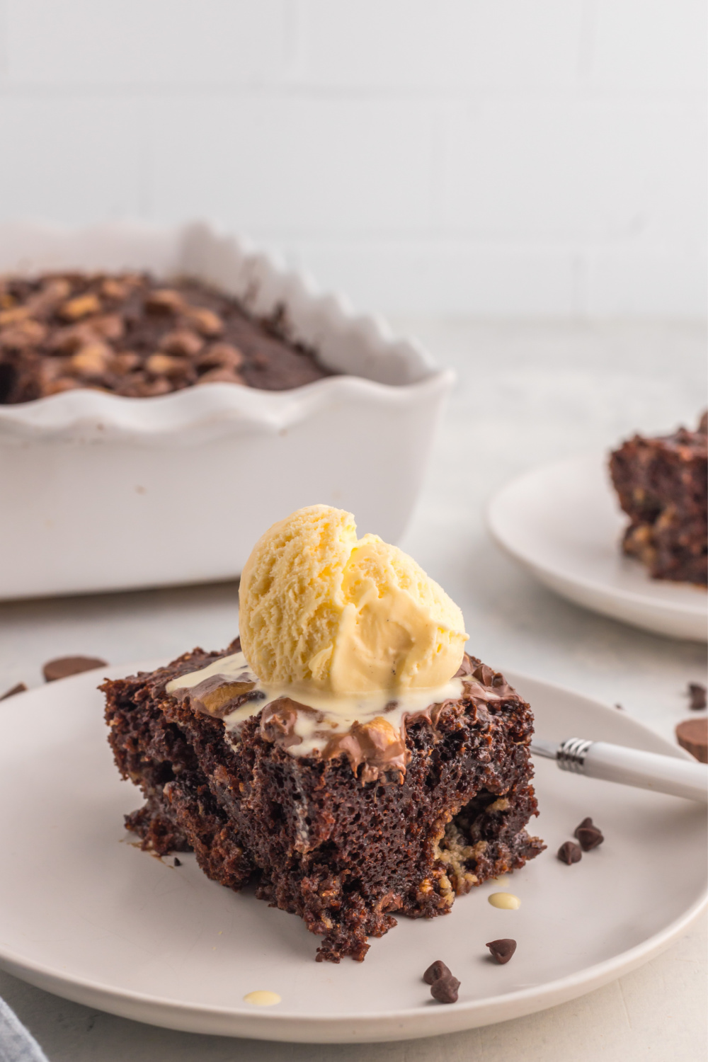 Chocolate Peanut Butter Earthquake Cake with ice cream on top