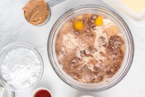 Devil's Chocolate cake mix box. Combine the cake mix, eggs, oil, and water in a bowl