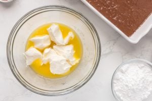 butter and softened cream cheese in a bowl
