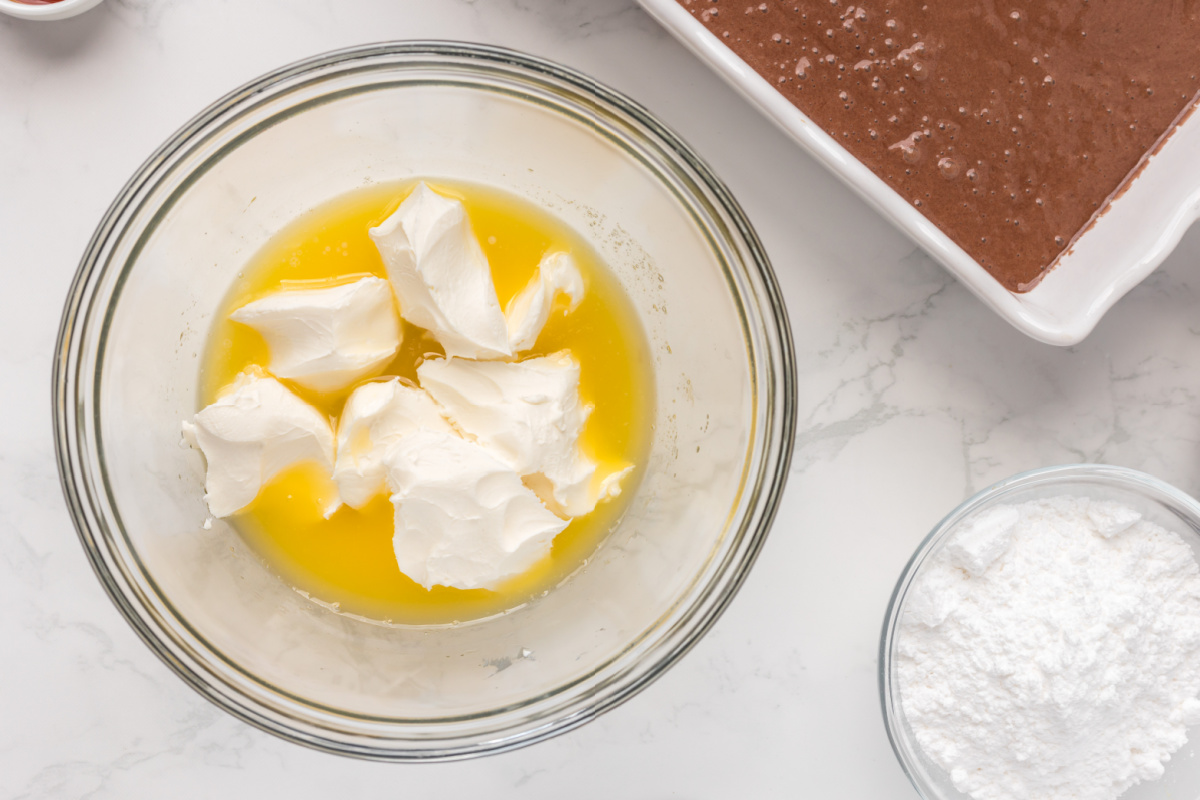 butter and softened cream cheese in a bowl