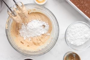 powdered sugar added to bowl