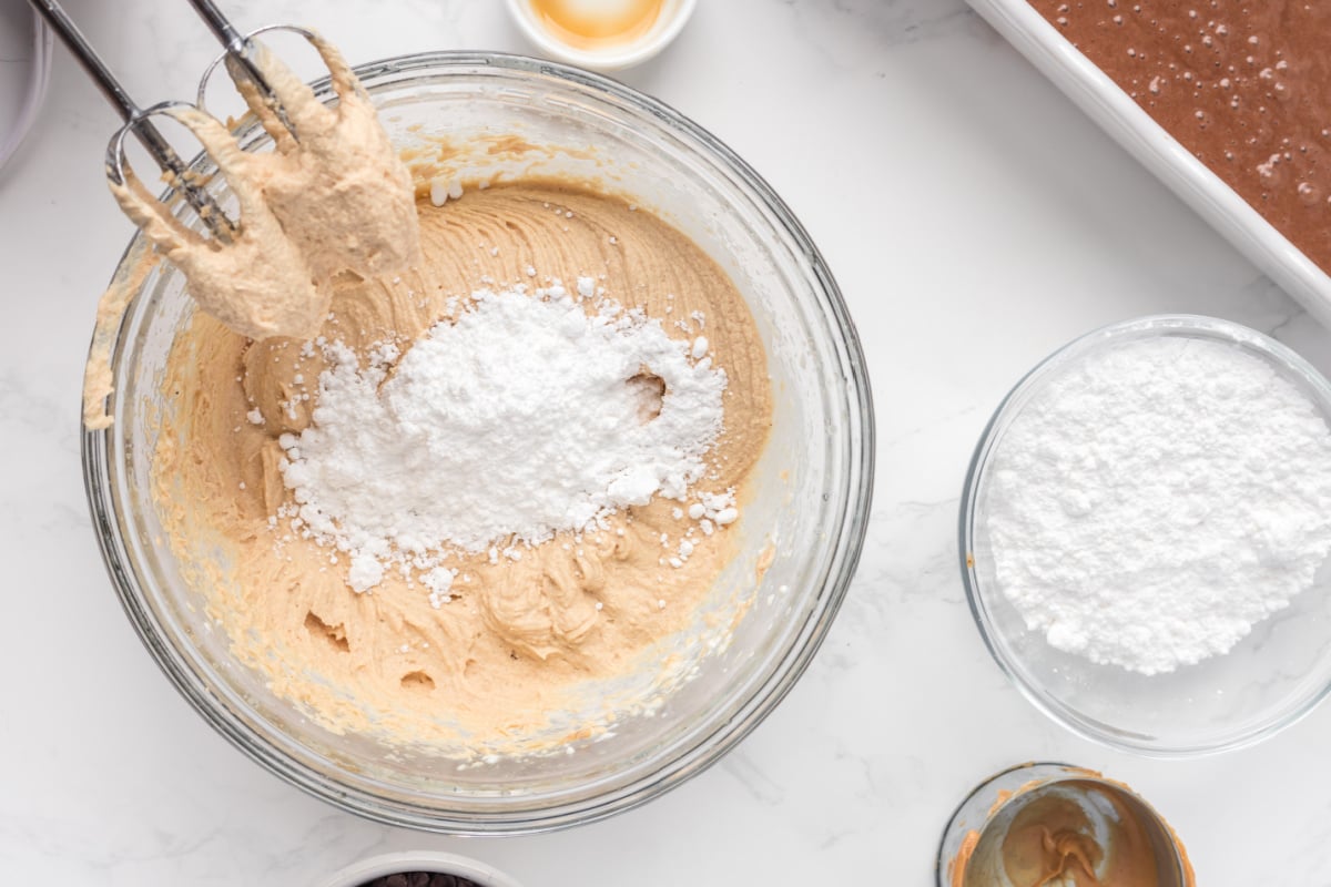 powdered sugar added to bowl