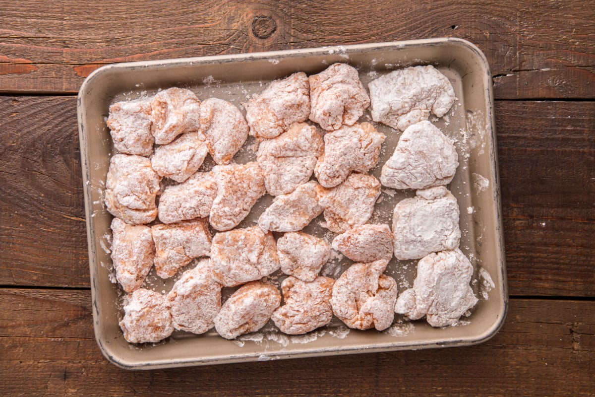 chicken pieces on a baking dish