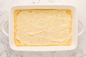 sauce spread on top of crescent dough