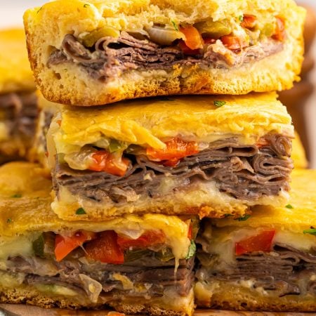 Philly Cheesesteak Squares stacked on a plate