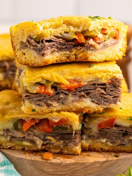 Philly Cheesesteak Squares stacked on a plate