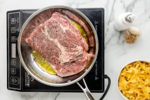 beef placed in pan