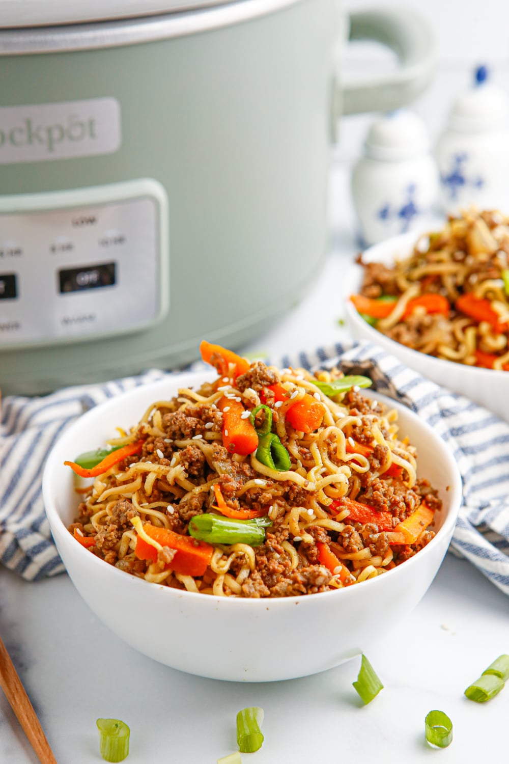 Slow cooker asian beef ramen noodles in two bowls