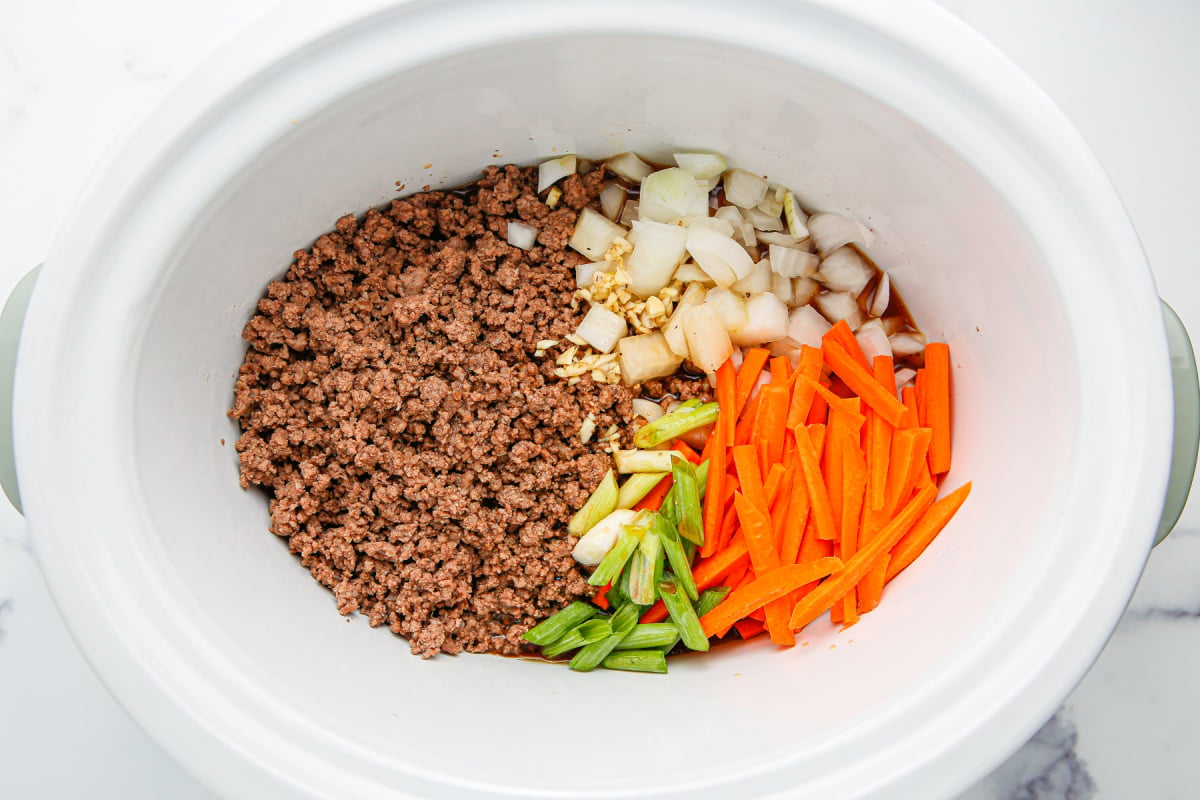 veggies and beef added to slow cooker