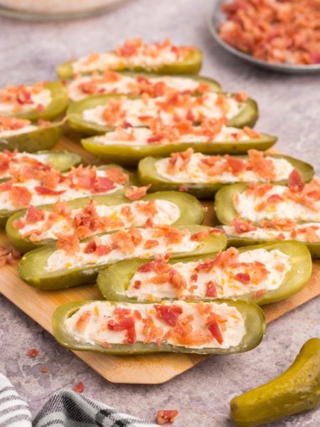 Stuffed Dill Pickles on a cutting board