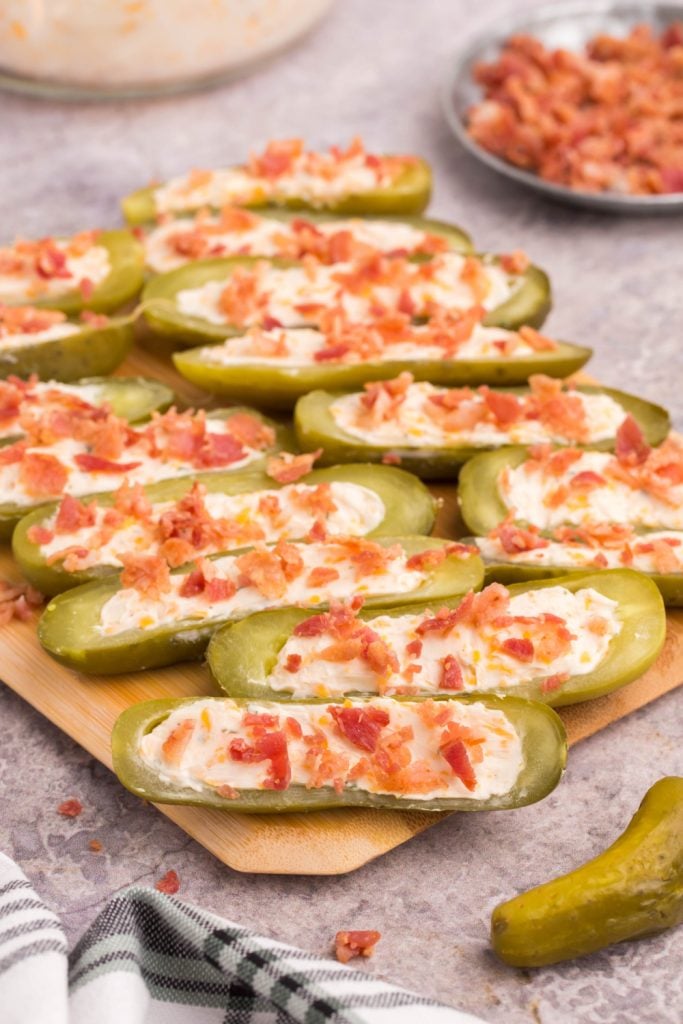 Stuffed Dill Pickles on a cutting board