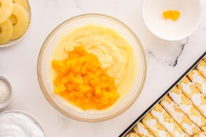 diced mangos added to bowl