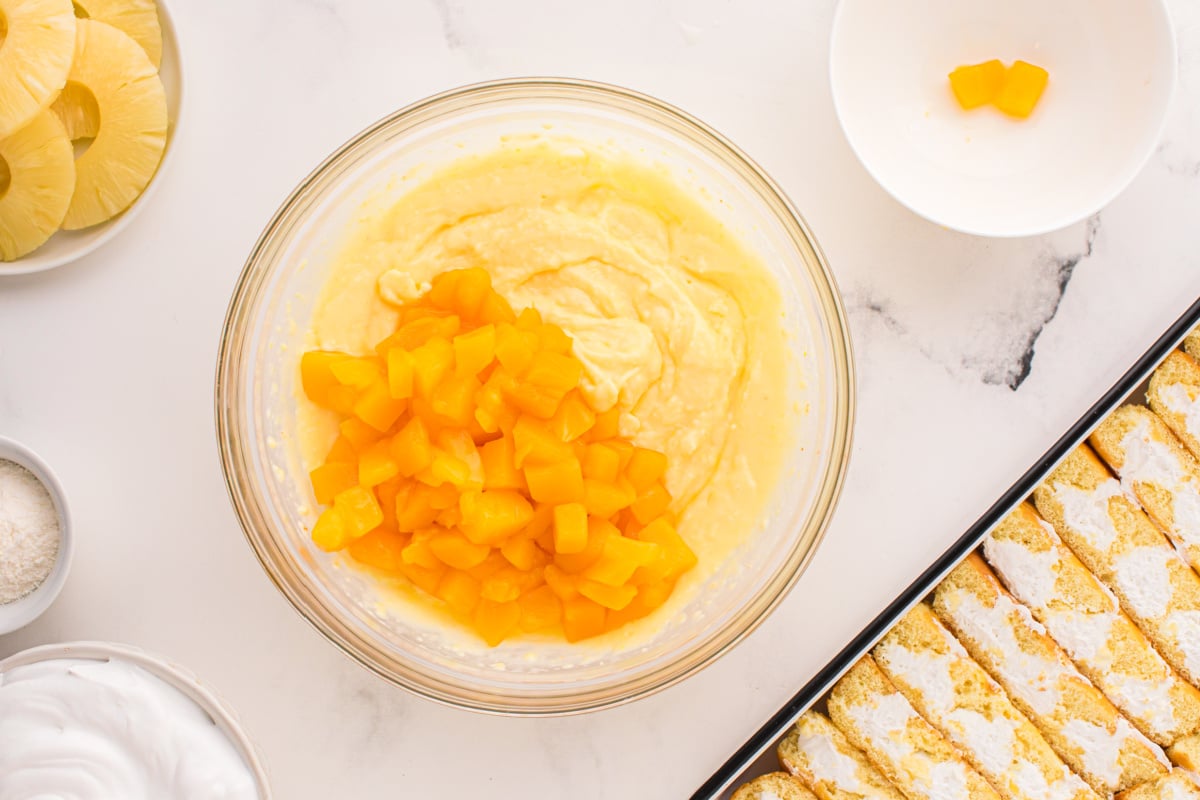 diced mangos added to bowl