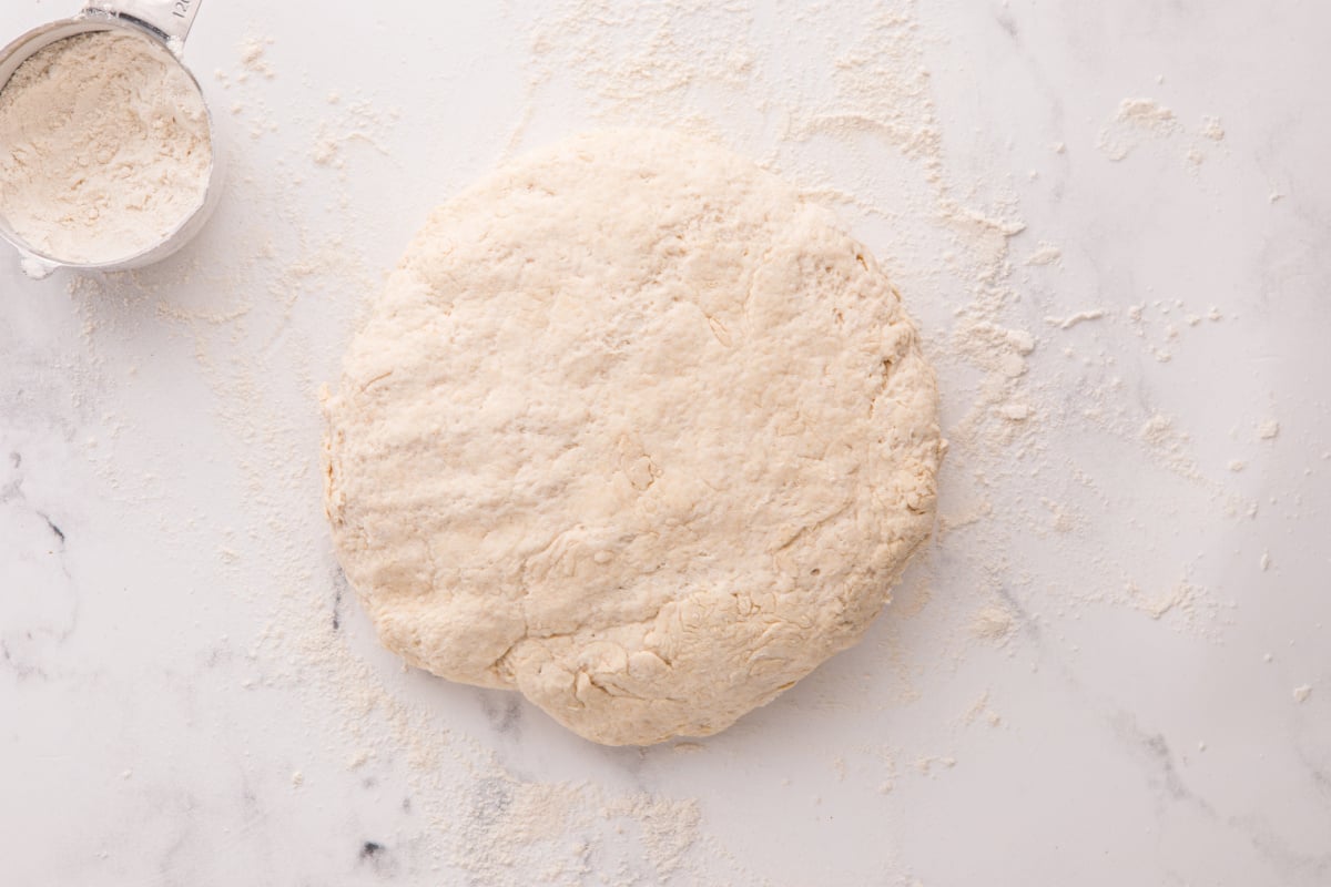 dough ball on a floured counter