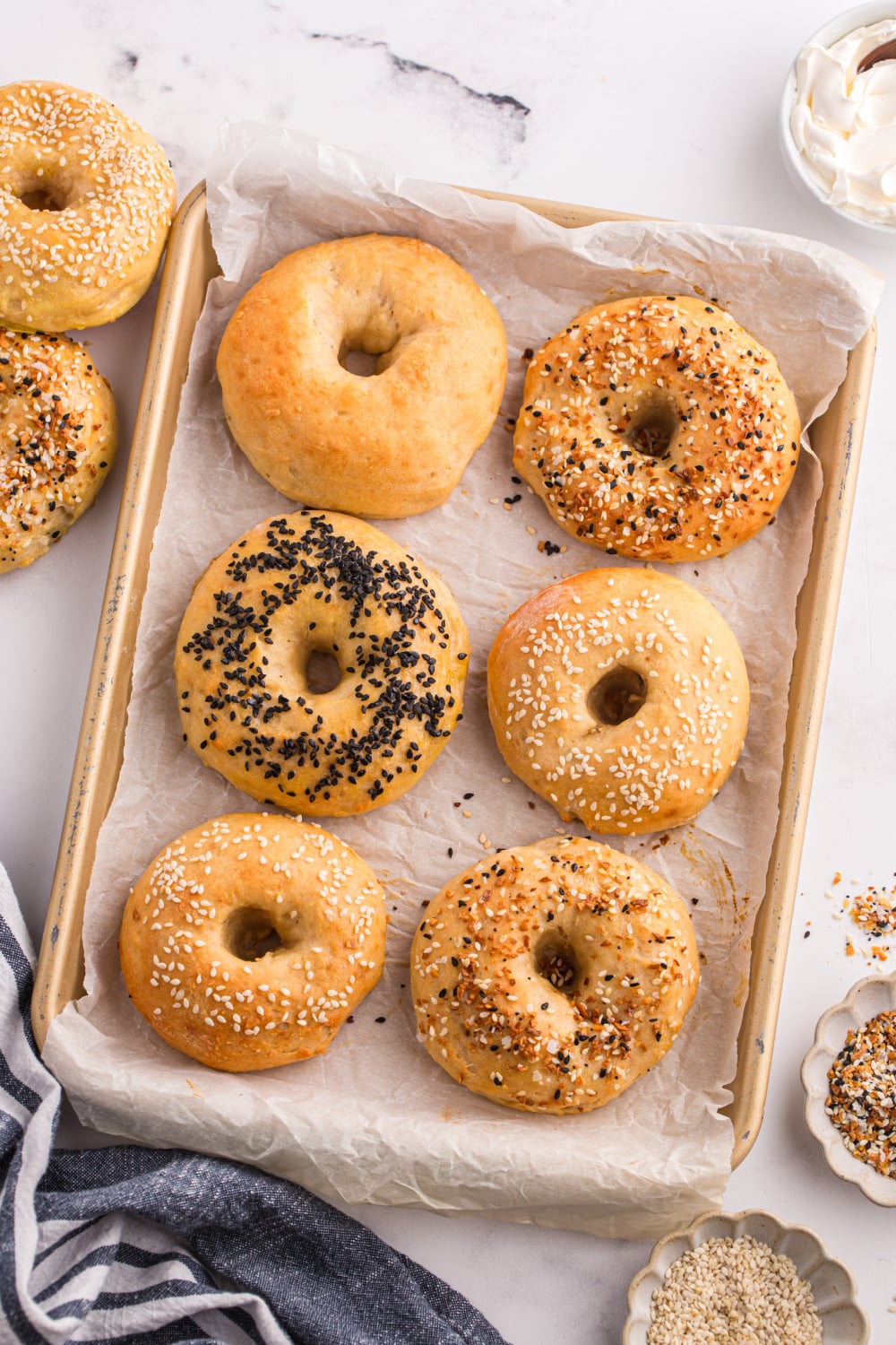 cooked bagels on baking sheet