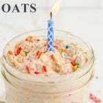Birthday Cake Overnight Oats in a jar with a birthday candle