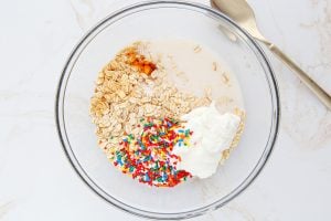 ingredients for Birthday Cake Overnight Oats in a bowl