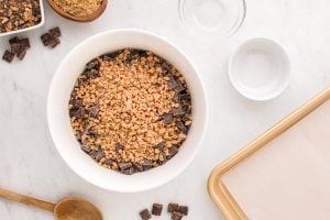 chocolate chunks and toffee pieces added to mixing bowl