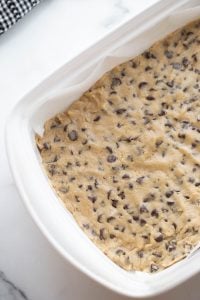 cookie dough pressed into bottom of pan