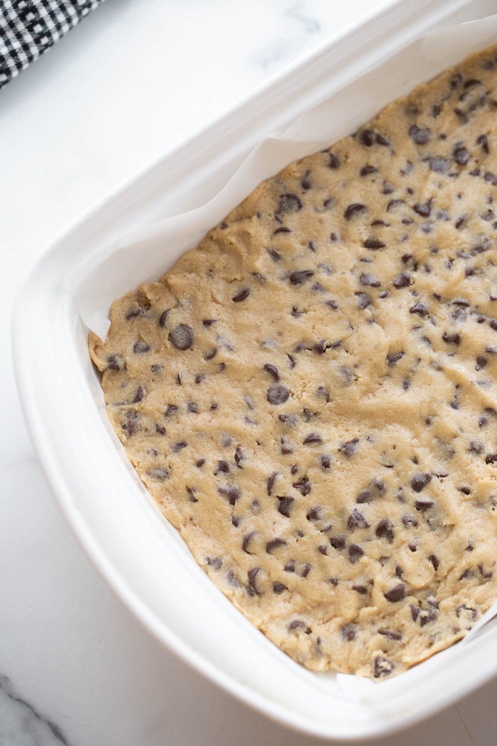 cookie dough pressed into bottom of pan